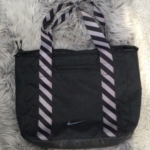 Nike tote bag.  Striped handles.